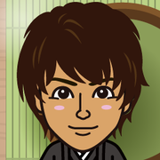 ���߂���