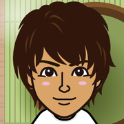 ���߂���