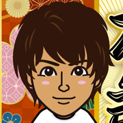 ���߂���