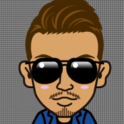 �߂���