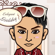 �߂�